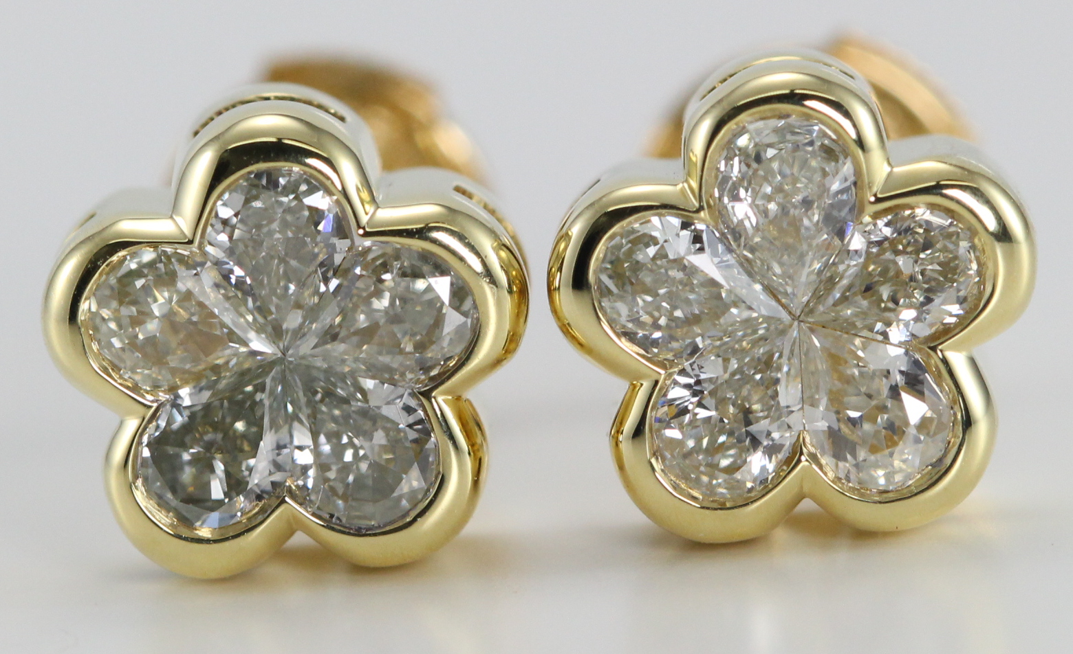 18k Yellow Gold Invisible Setting Pear Cut Diamond Flower Earrings (0.73 Ct, M-N Color, VS Clarity)