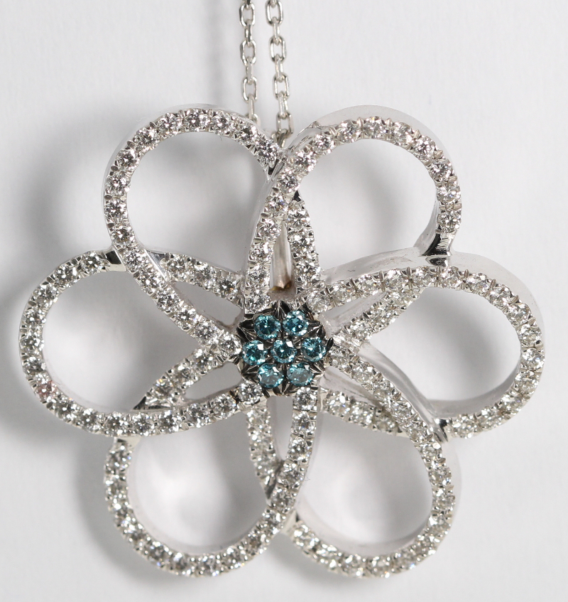Diamond Flower Pendant in 18k White Gold Setting with 115 Blue & White Diamond Equaling 0.98 carats
