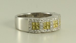 18 kt white gold ring with color enhanced fancy yellow princess cut & white round diamonds from the new 2017 collection