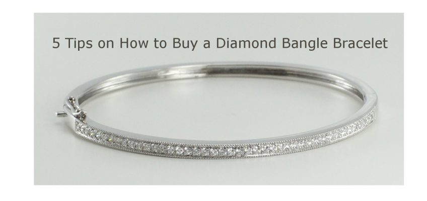 A diamond bangle bracelet with an 18 karat white gold setting