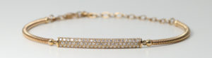 Rose gold spiral bracelet with diamonds