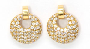 These yellow gold round cut diamond encrusted earrings are part of our winter collection at CaratsDirect2u